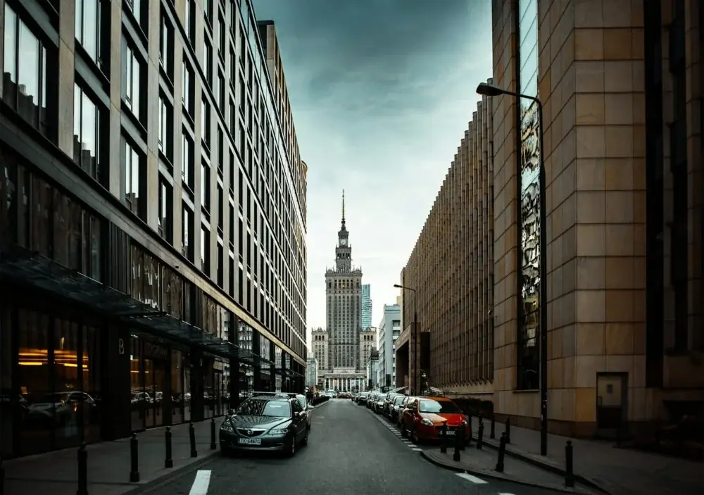 a street with cars and buildings on either side of it