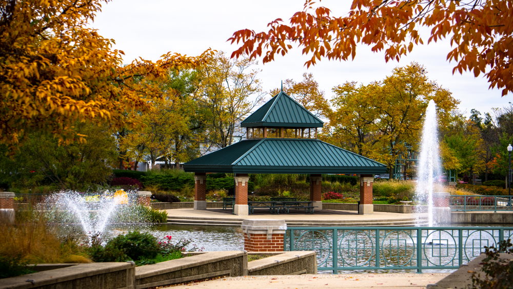 Schaumburg Square in Schaumburg Illinois fall autumn colors fountain in park USA