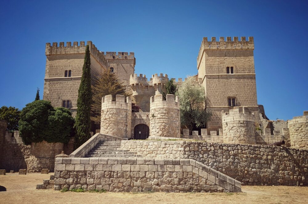 a stone building with a stone wall
