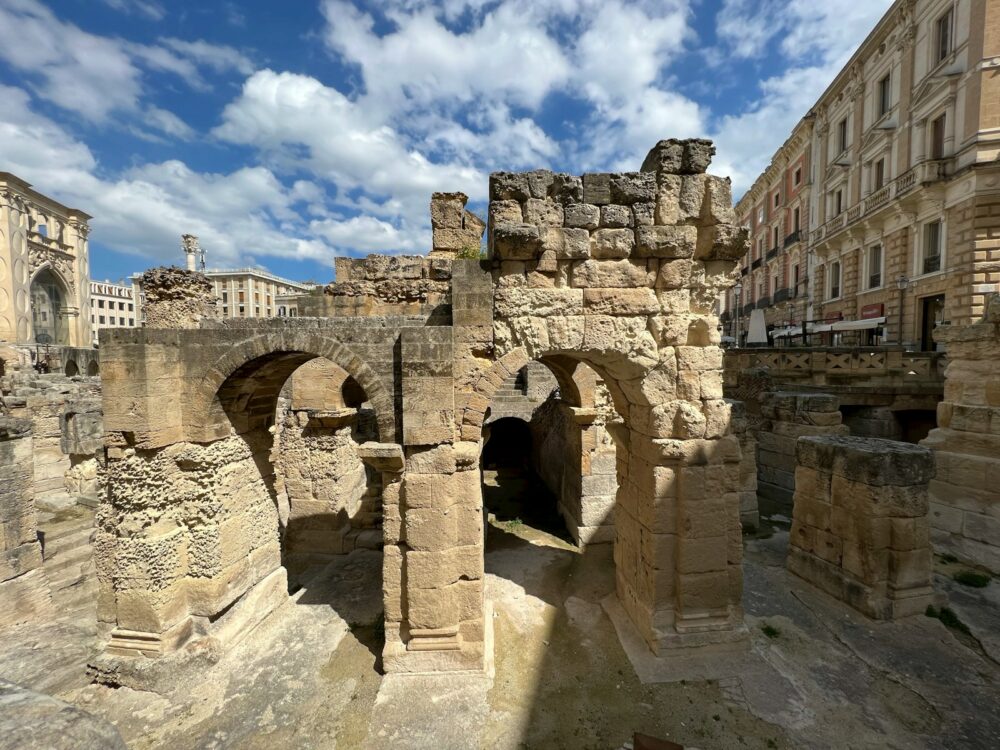 a view of a stone building with a sky background