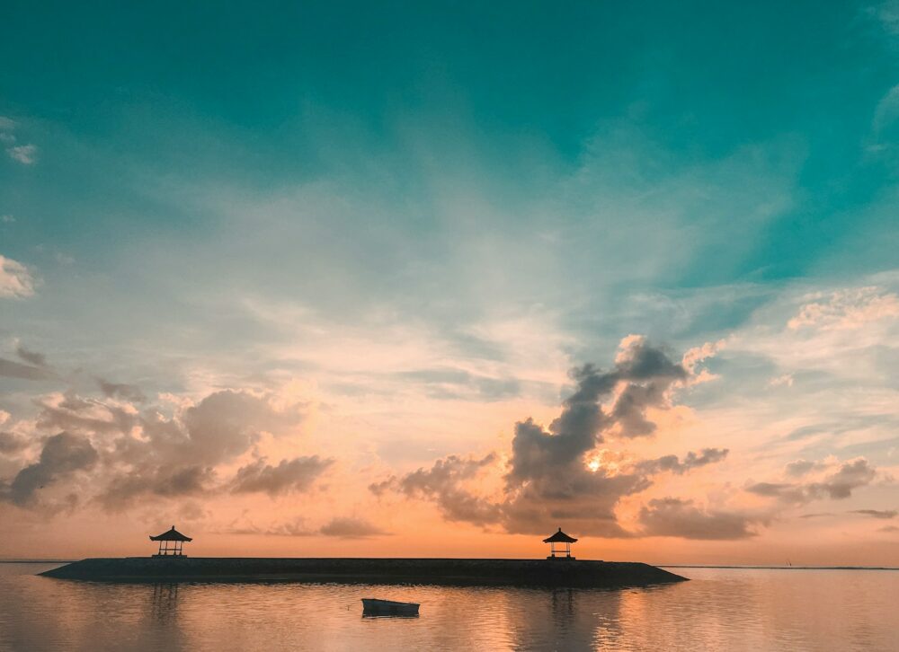 silhouette of cottages at golden hour
