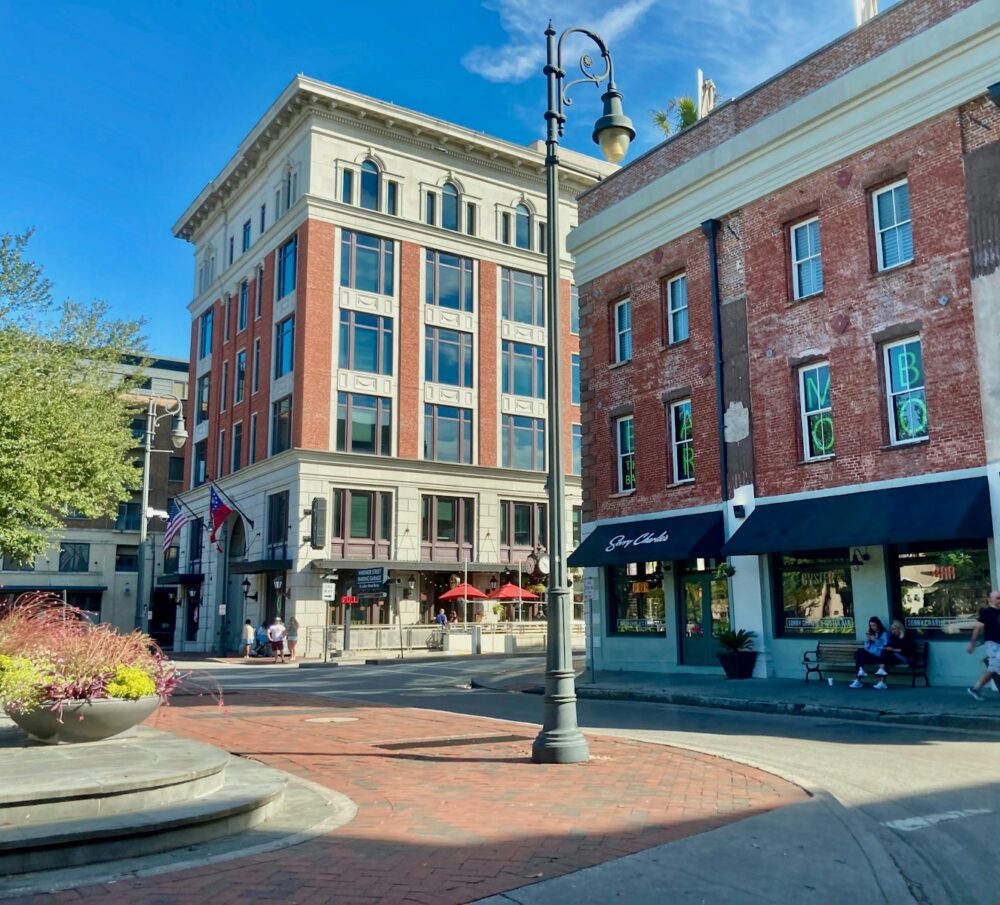 a red brick building sitting on the corner of a street